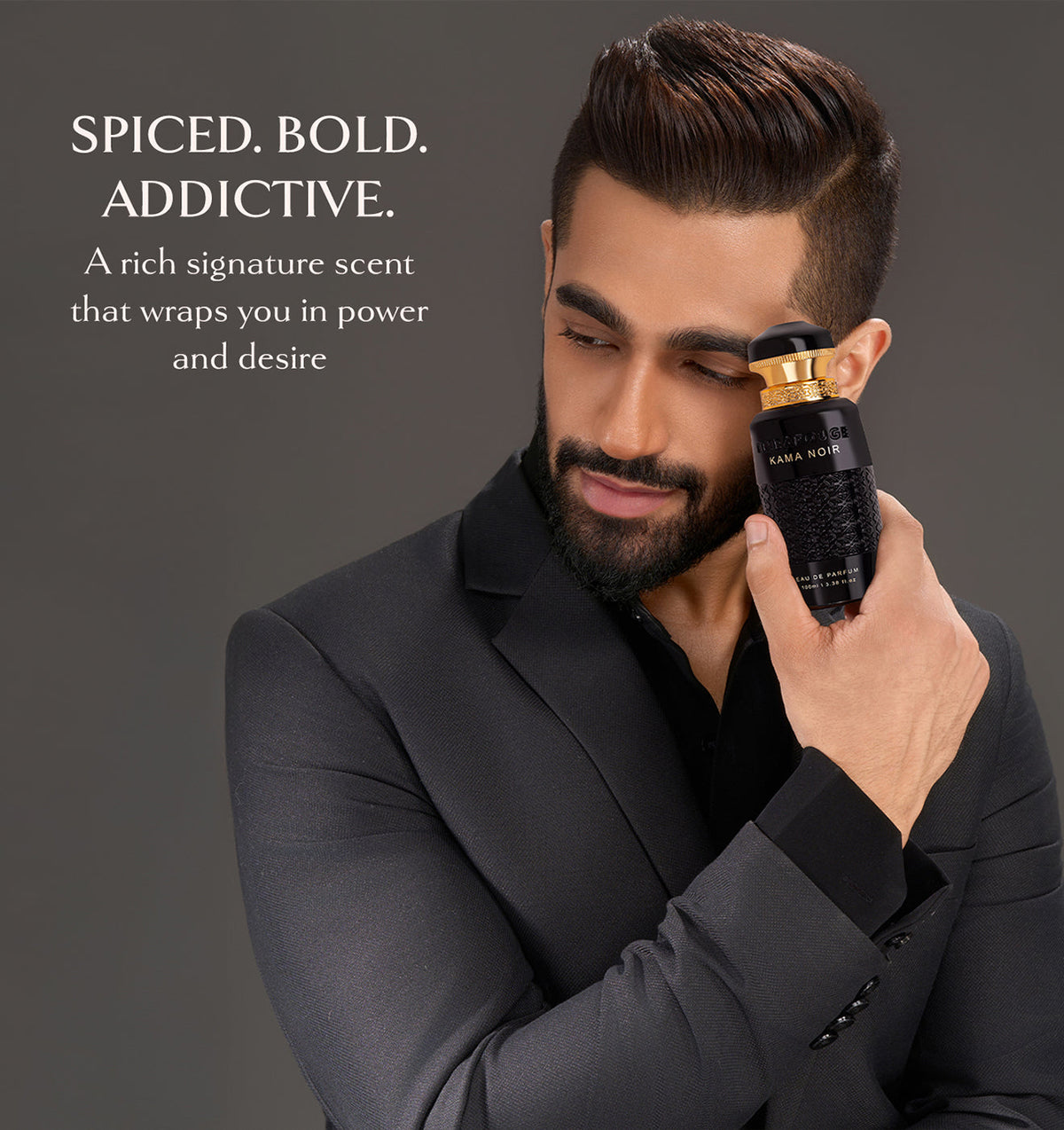 Man holding Embarouge Kama Noir Luxury perfume for him Eau De Parfum 100ml lifestyle image