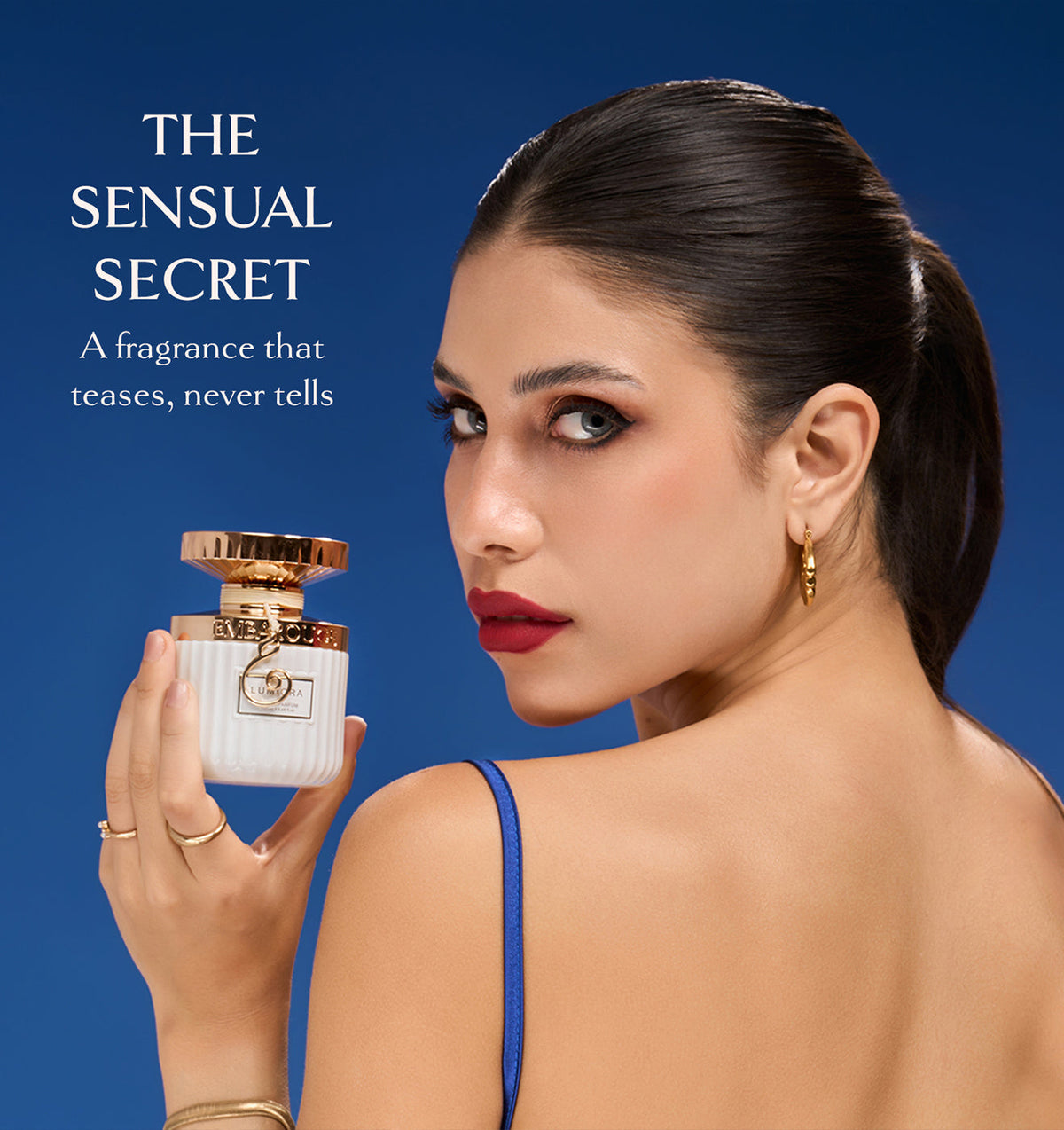 Women holding Embarouge Lumiora Luxury perfume for women Eau De Parfum 100ml lifestyle image